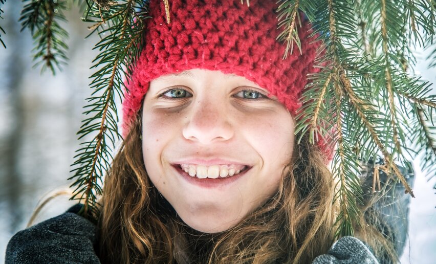 Bambina nella neve, il ritratto della salute | © Archivio APT Val di Sole - Ph Matteo Pavana